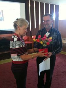 Dagmar Parer, Director of Studies, National Archives of Australia being presented with thank you gifts by Niles Elvery, Manager, Pubic Access, Queensland State Archives